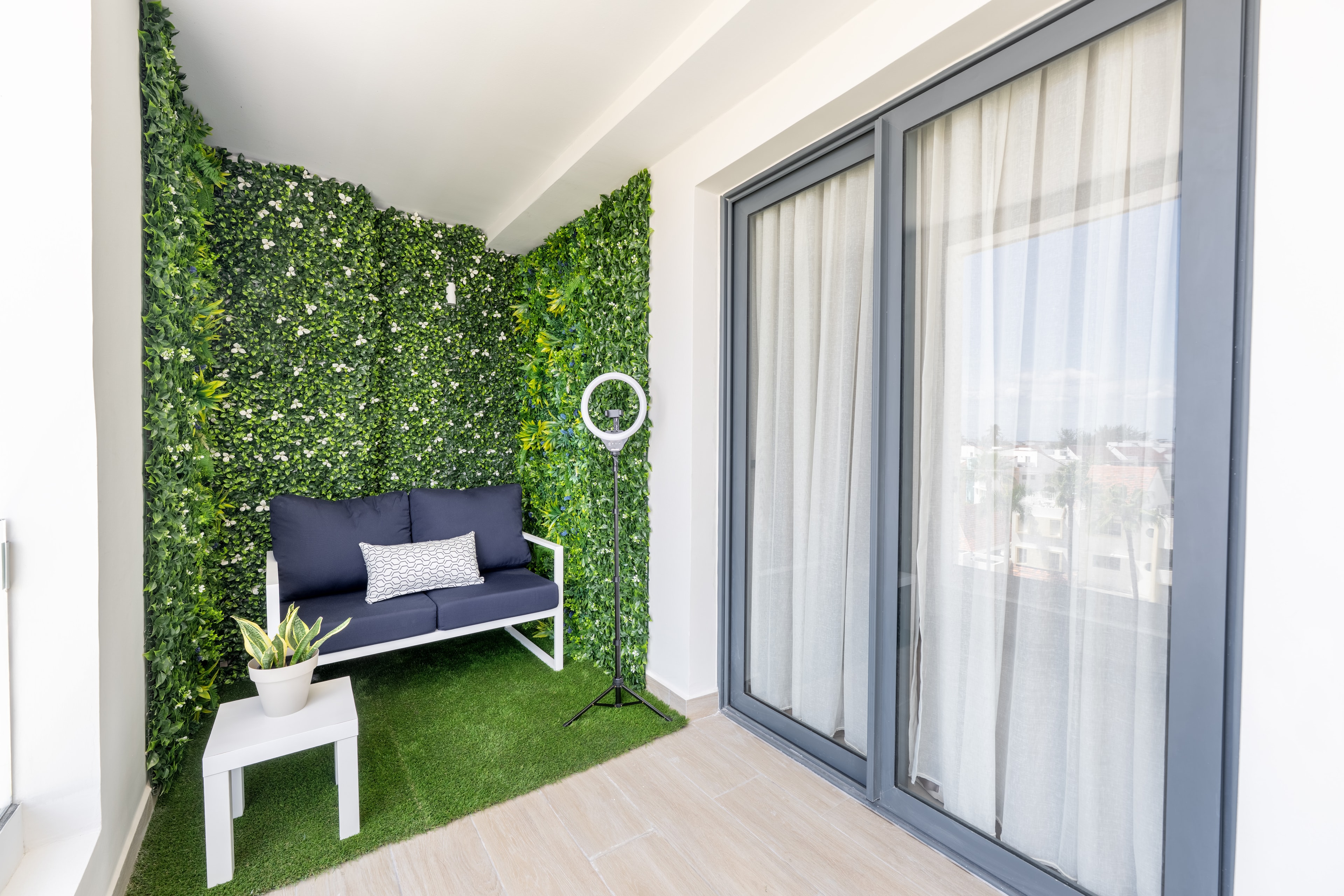Content creator workspace with natural light at AlaNiqueStay